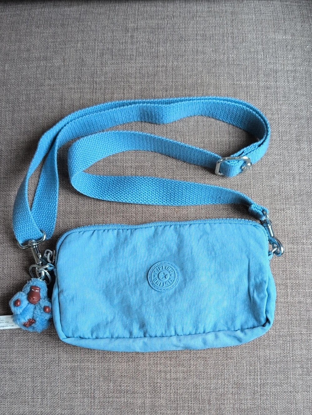 Kipling Light Blue Crossbody Bag with Woven Strap
